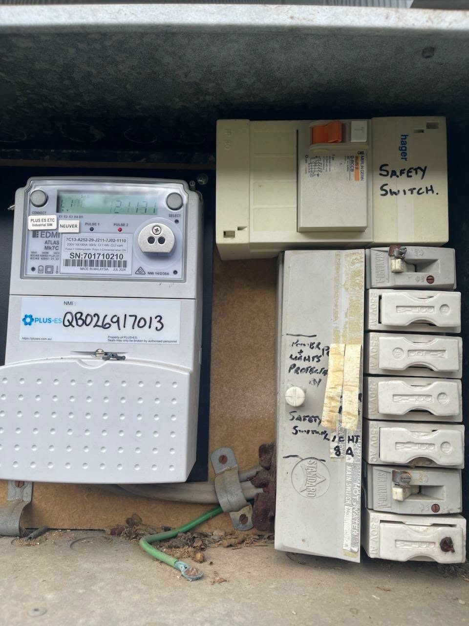 Ageing electrical switchboard with rewireable fuses and safety switch in Brisbane